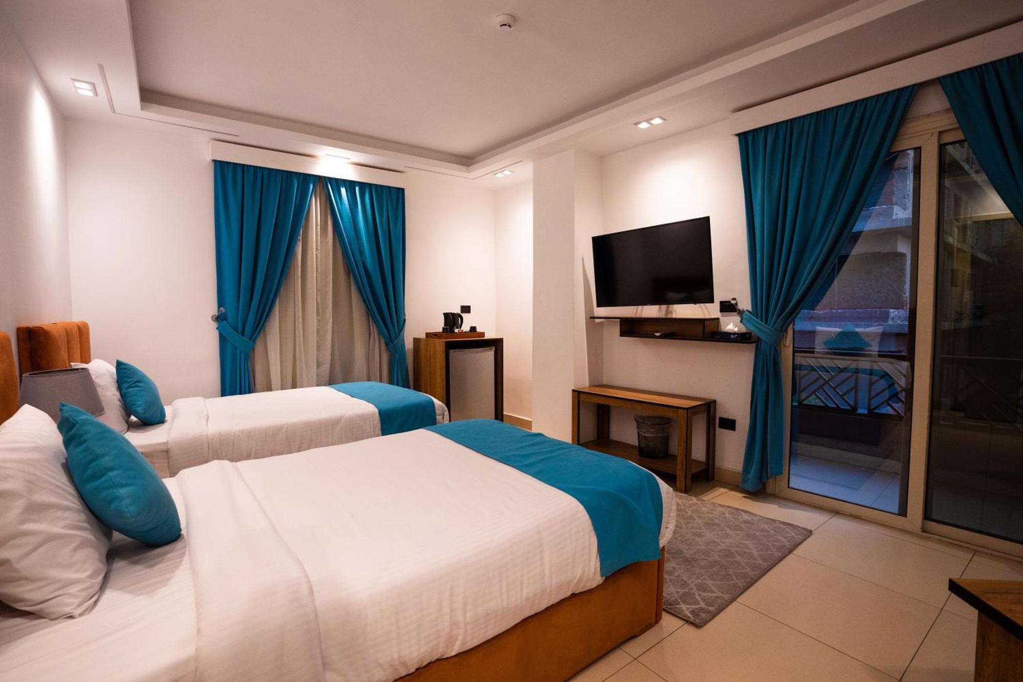 Pyramids Gem Plaza Hotell Kafret el-Gabal Exteriör bild