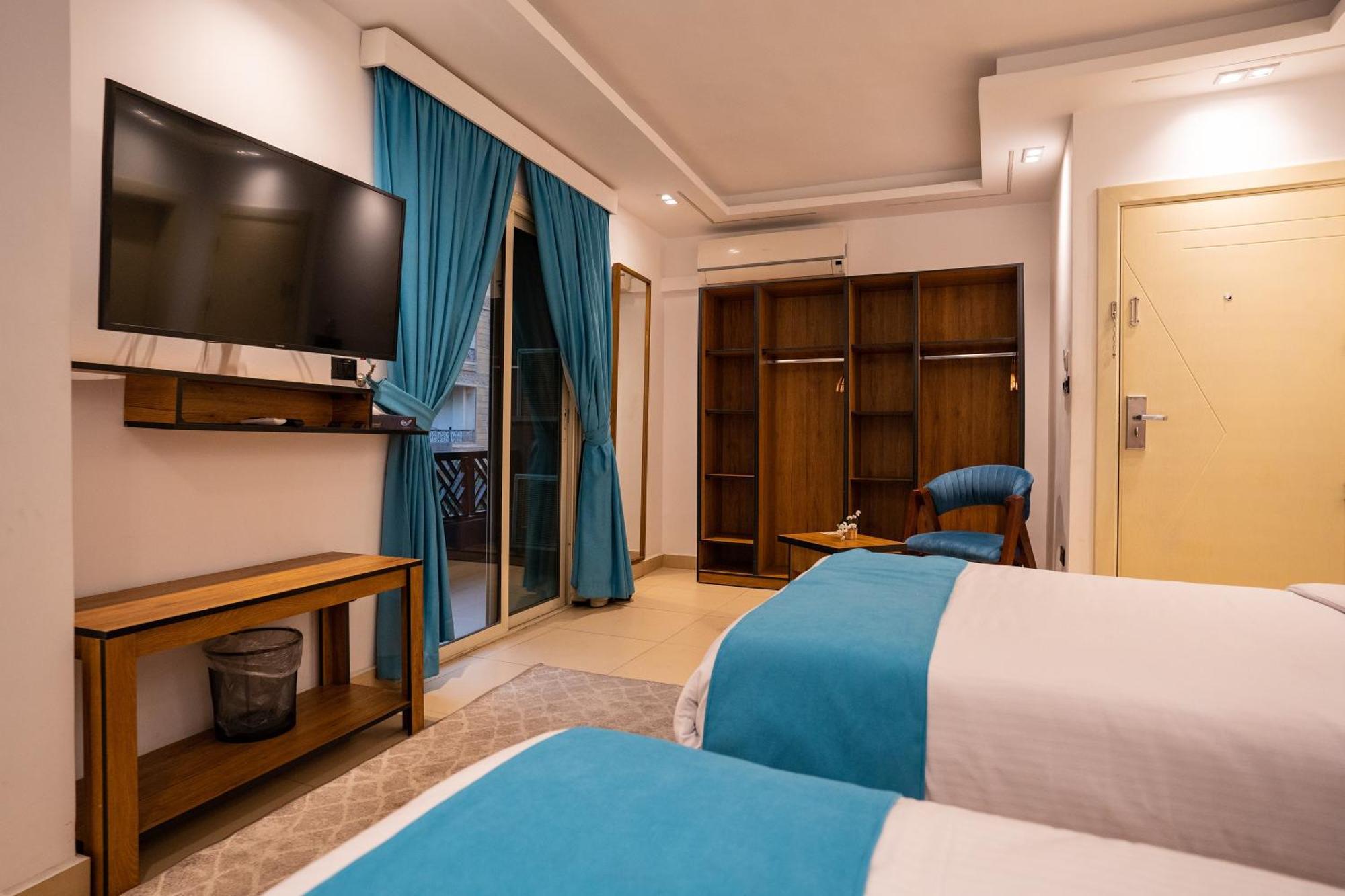 Pyramids Gem Plaza Hotell Kafret el-Gabal Exteriör bild