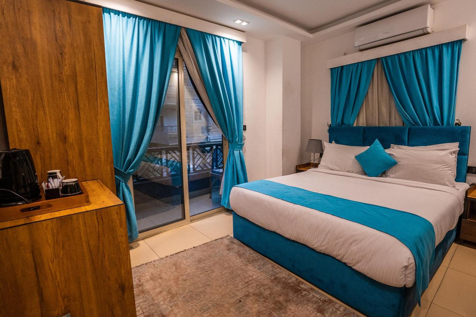 Pyramids Gem Plaza Hotell Kafret el-Gabal Exteriör bild